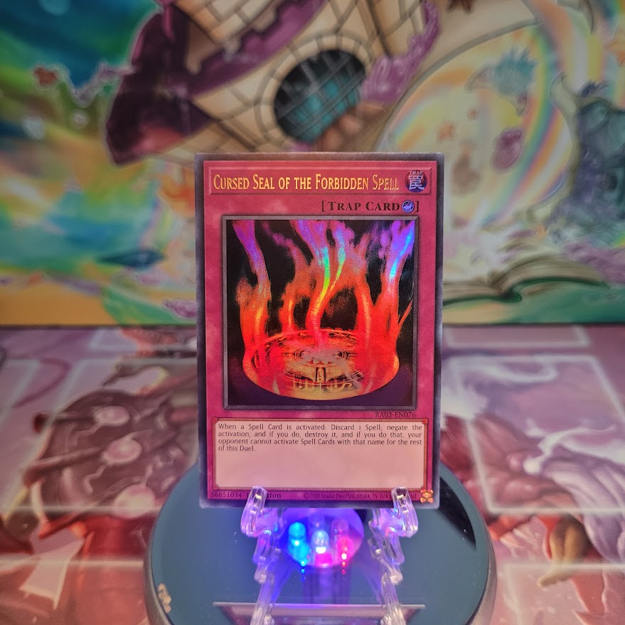 An Ultra Rare "Cursed Seal of the Forbidden Spell" card from the Yugioh Set: Quarter Century Bonanza (RA03).