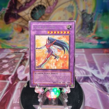 A Rare "Cyber Blader" card from the Yugioh Set: Dark Revelation 4 (DR04).