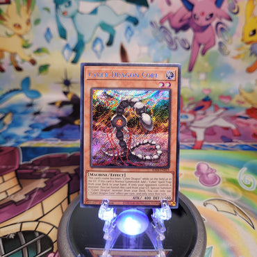 A Secret Rare "Cyber Dragon Core" card from the Yugioh Set: Quarter Century Stampede (RA04).