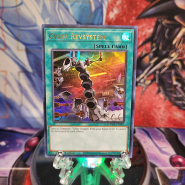 An Ultra Rare "Cyber Revsystem" card from the Yugioh Set: Magnificent Mavens.