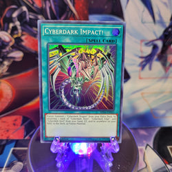  A Super Rare "Cyberdark Impact" card from the Yugioh Set: Shadows in Valhalla.