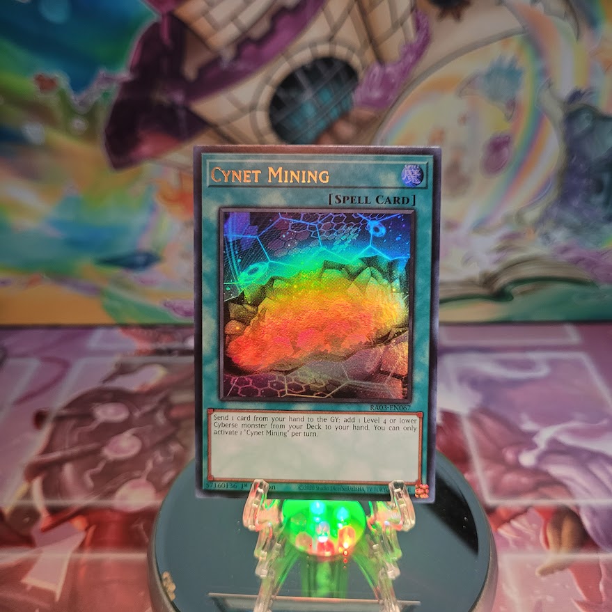 An Ultra Rare "Cynet Mining" card from the Yugioh Set: Quarter Century Bonanza (RA03).