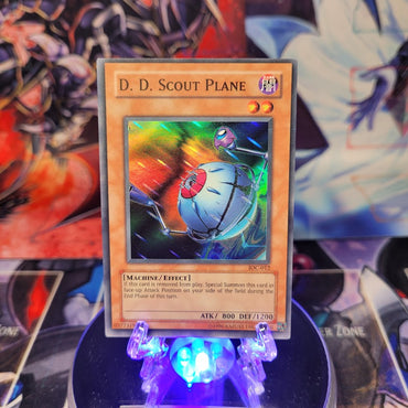 A Super Rare "D.D. Scout Plane" card from the Yugioh Set: Invasion of Chaos.