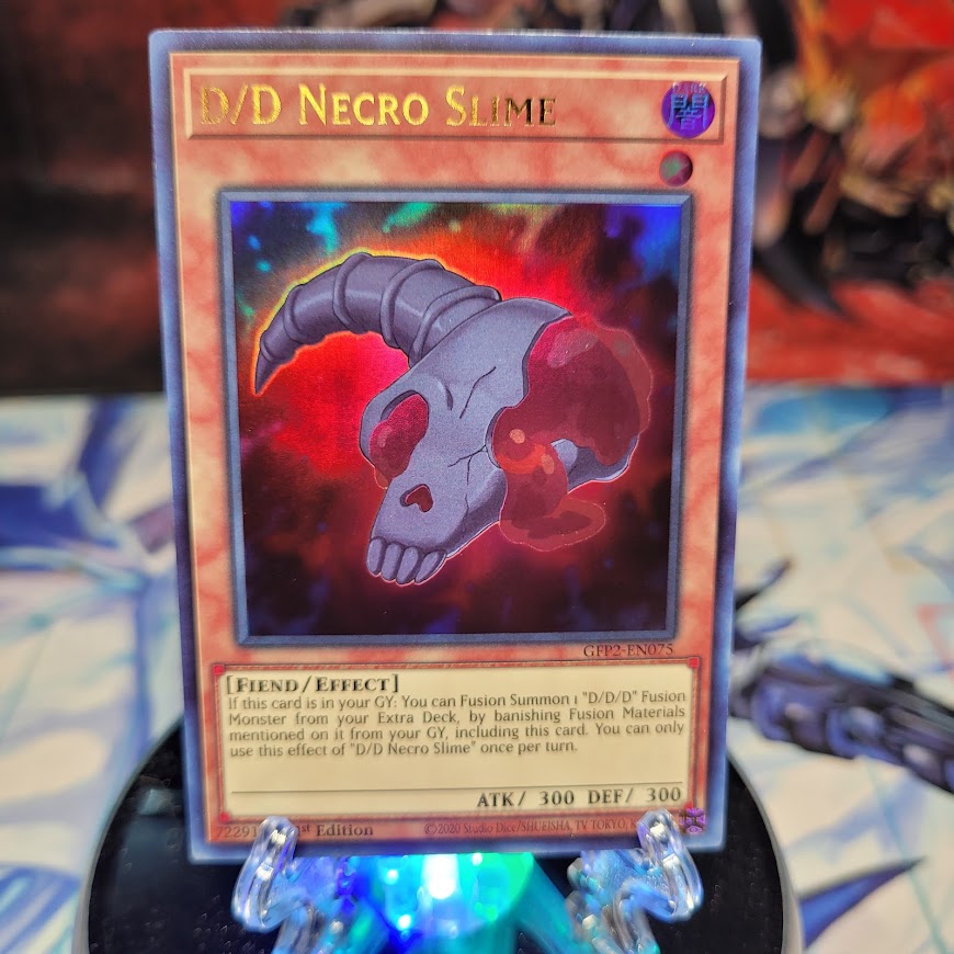  An Ultra Rare "D/D Necro Slime" card from the Yugioh Set: Ghosts From the Past: The 2nd Haunting (GFP2).