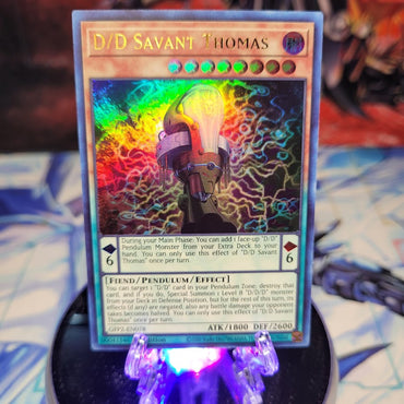  An Ultra Rare "D/D Savant Thomas" card from the Yugioh Set: Ghosts From the Past: The 2nd Haunting (GFP2).