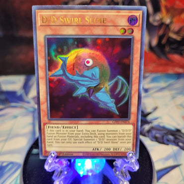  An Ultra Rare "D/D Swirl Slime" card from the Yugioh Set: Ghosts From the Past: The 2nd Haunting (GFP2).