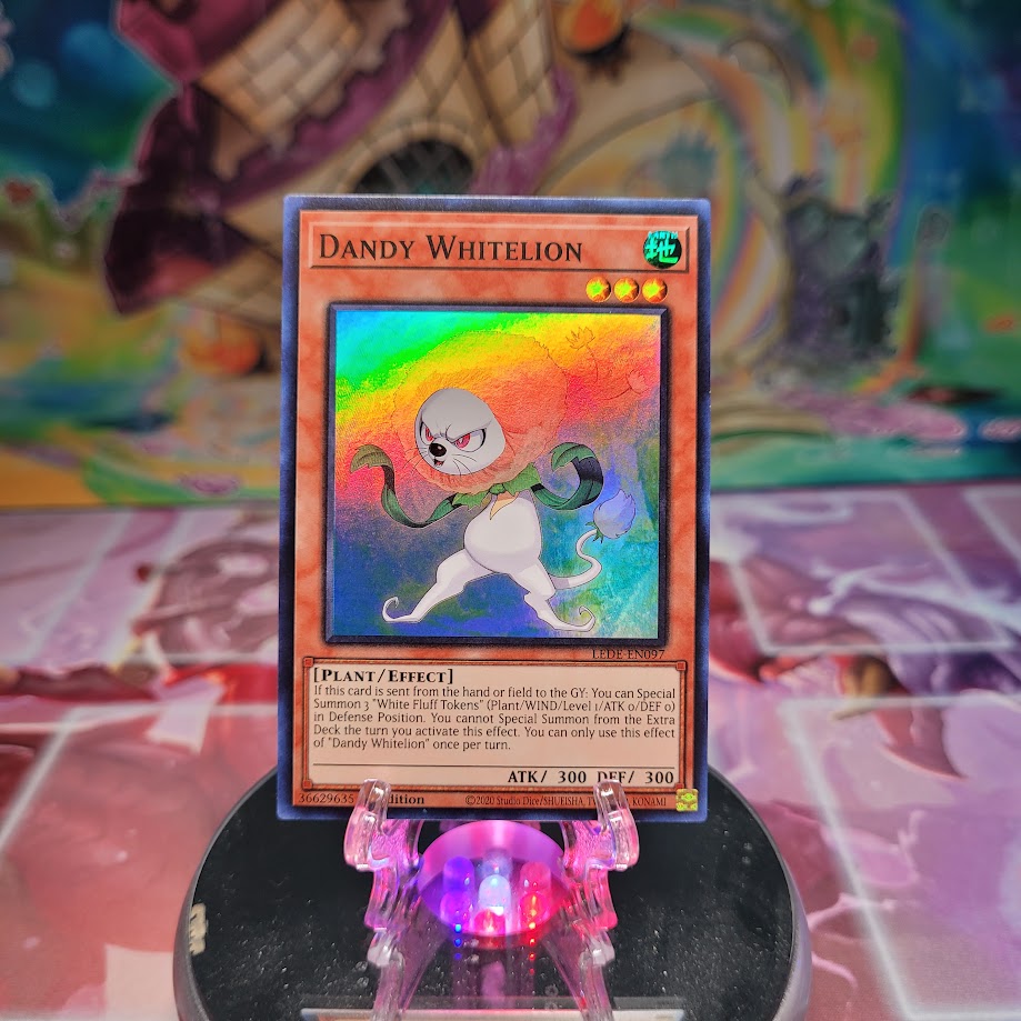 A Super Rare "Dandy Whitelion" card from the Yugioh Set: Legacy of Destruction.