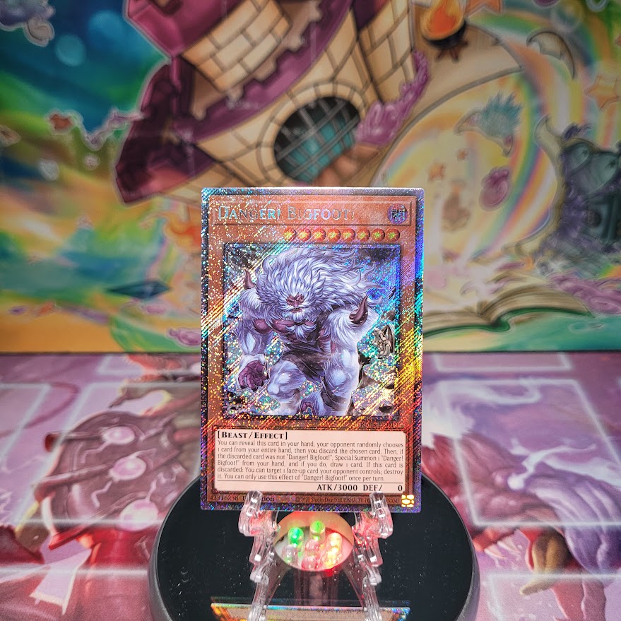 A Platinum Secret Rare Alternate Art "Danger! Bigfoot!" card from the Yugioh Set: Quarter Century Bonanza (RA03)