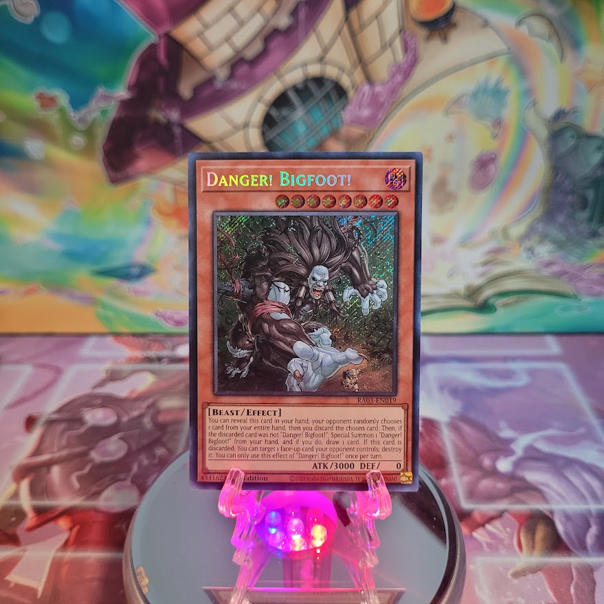  A Secret Rare "Danger! Bigfoot!" card from the Yugioh Set: Quarter Century Bonanza (RA03).