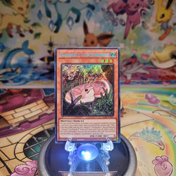 A Secret Rare "Danger!? Tsuchinoko?" card from the Yugioh Set: Quarter Century Stampede (RA04).