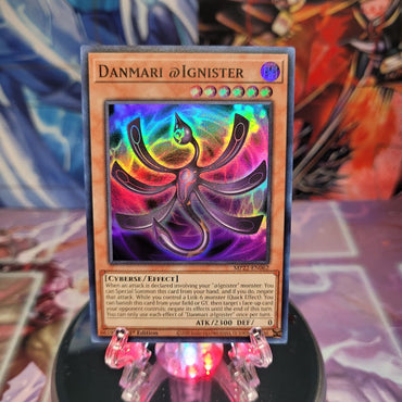 A Super Rare "Danmari @Ignister" card from the Yugioh 2022 Tin of the Pharaoh's Gods Set (MP22).