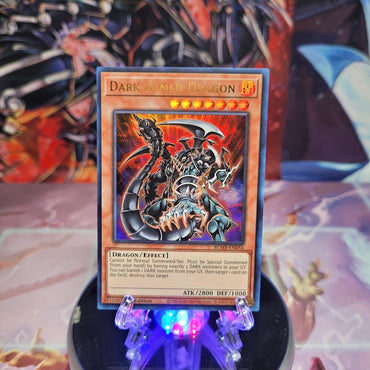 An Ultra Rare "Dark Armed Dragon" card from the Yugioh Set: Battles of Legend: Monstrous Revenge.