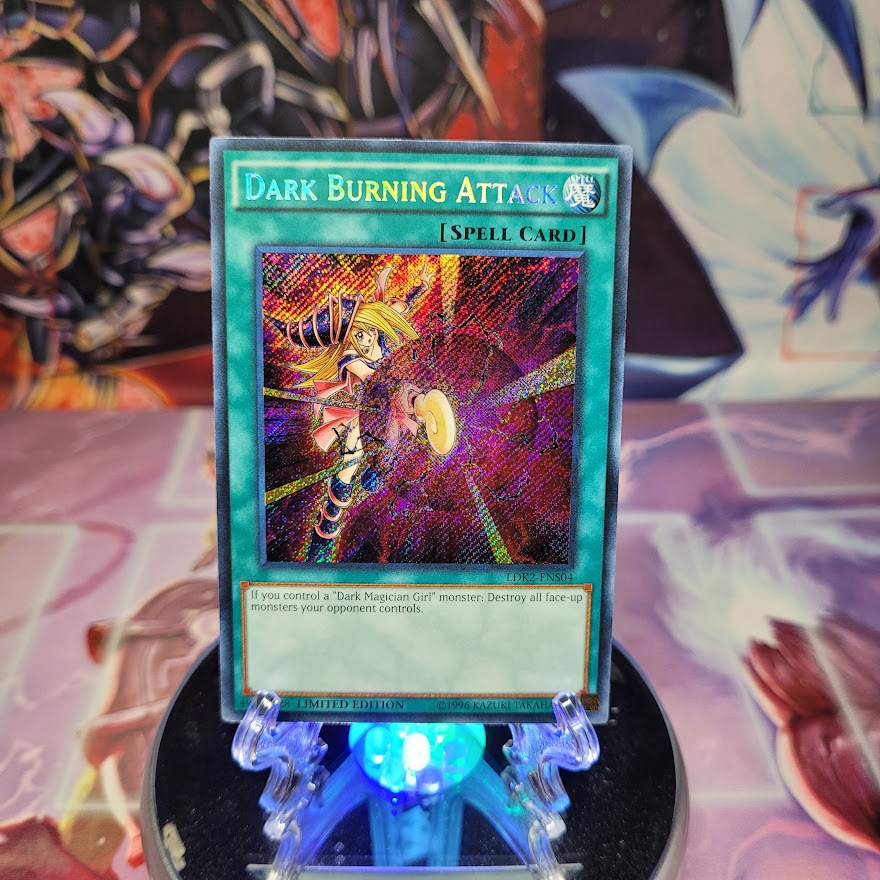 A Secret Rare "Dark Burning Attack" card from the Yugioh Set: Legendary Decks 2 (LDK2) 2020 edition.