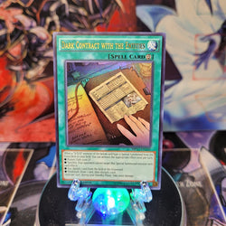 An Ultra Rare "Dark Contract with the Entities" card from the Yugioh 2017 Mega-Tins Mega Pack.