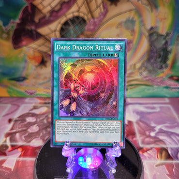 A Super Rare "Dark Dragon Ritual" card from the Yugioh Set: Dragons of Legend 2.