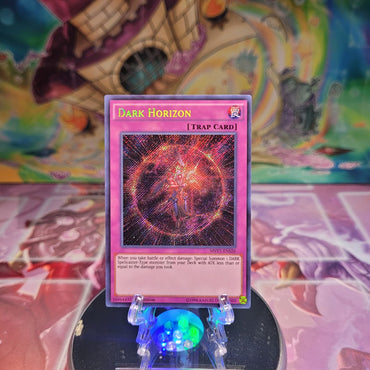 A Secret Rare "Dark Horizon" card from the Yugioh Set: The Dark Side of Dimensions Movie Pack: Secret Edition.