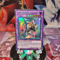 An Ultra Rare Alternate Art Green "Dark Magician Girl the Dragon Knight" card from the Yugioh Set: Dragons of Legend: The Complete Series (DLCS).