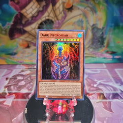 An Ultra Rare Red "Dark Necrofear" card from the Yugioh Set: Legendary Duelists: Season 3.