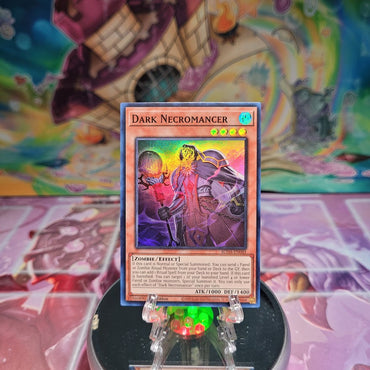 A Super Rare "Dark Necromancer" card from the Yugioh Set: Supreme Darkness (SUDA).