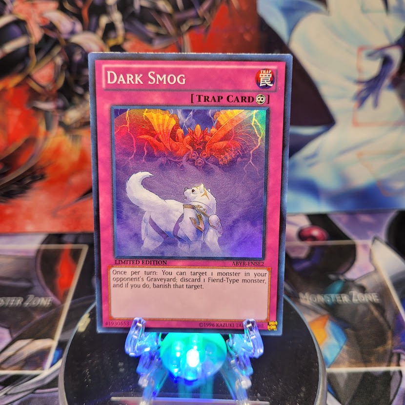 A Super Rare "Dark Smog" card from the Yugioh Set: Abyss Rising.