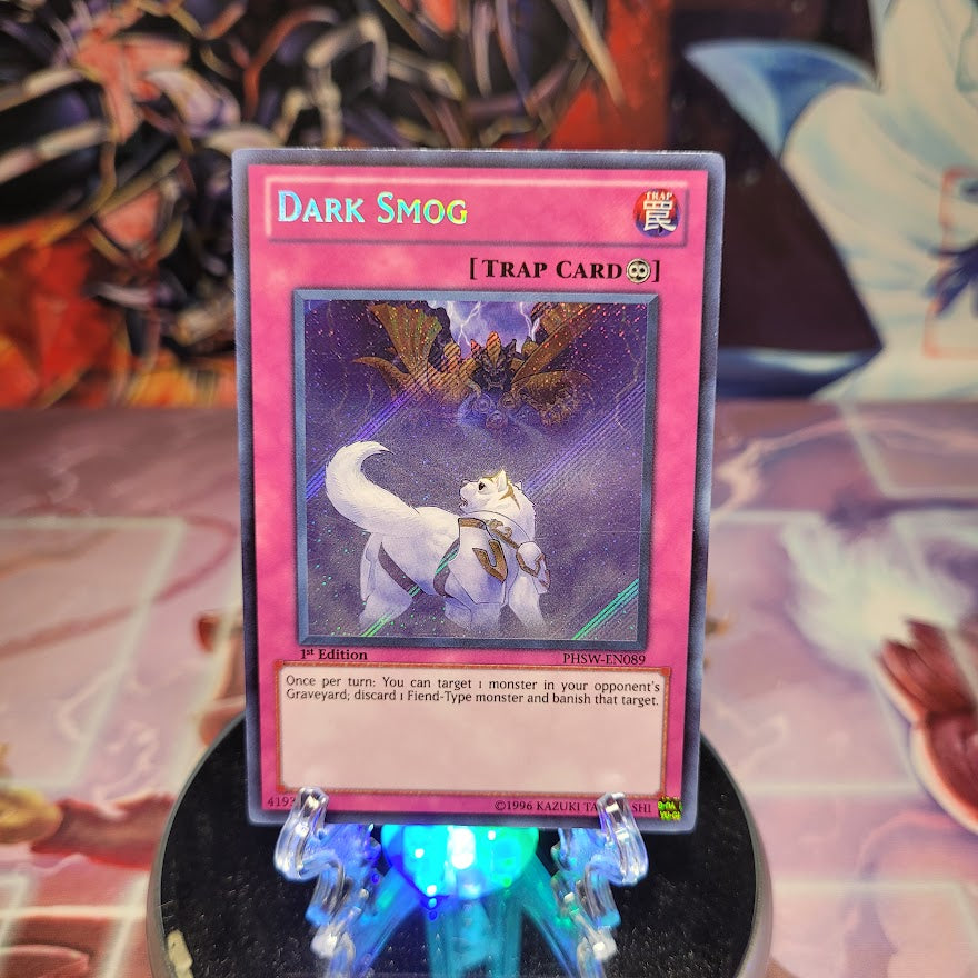 A Secret Rare "Dark Smog" card from the Yugioh Set: Photon Shockwave.