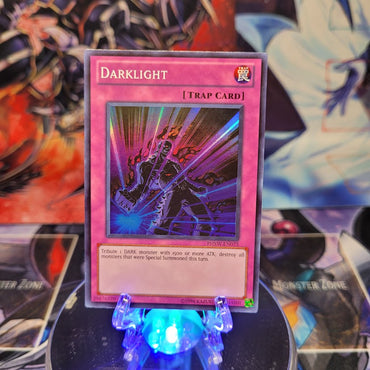 A Super Rare "Darklight" card from the Yugioh Set: Photon Shockwave.