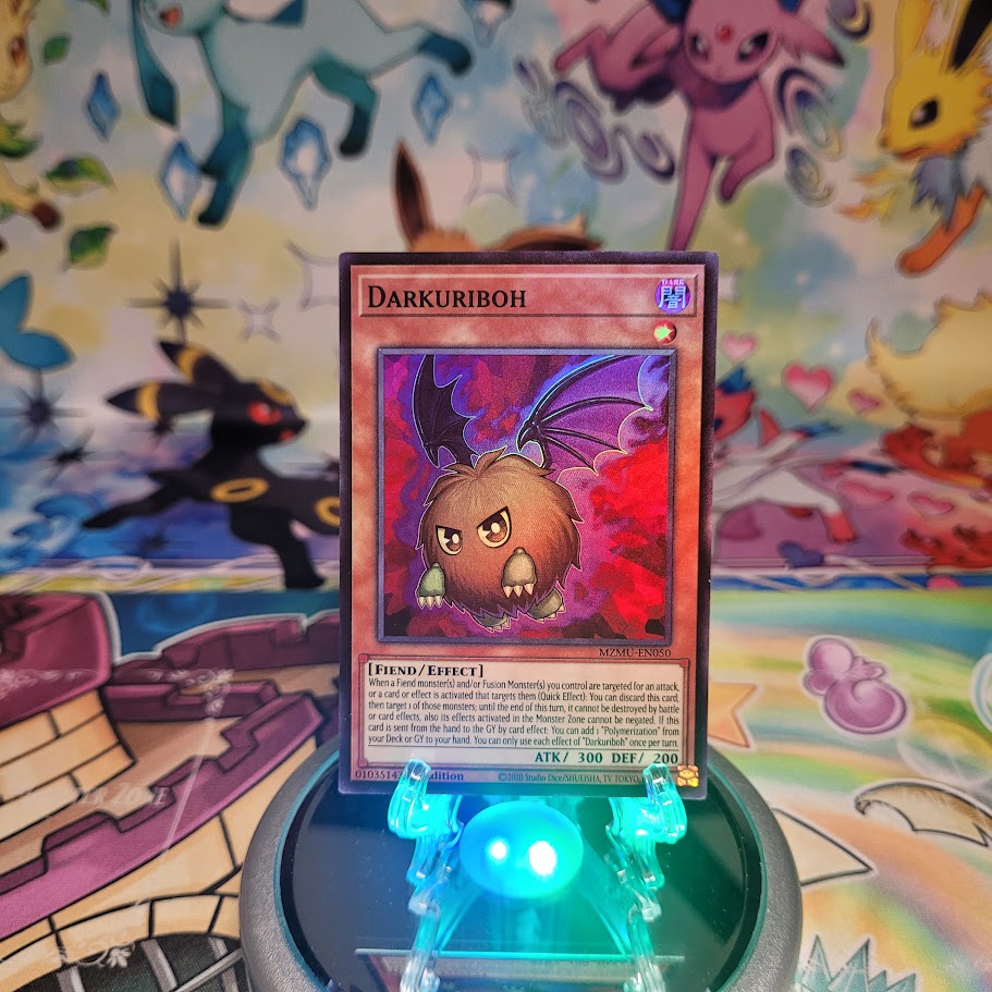 A Super Rare "Darkuriboh" card from the Yugioh Set: Maze of Muertos (MZMU).