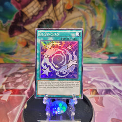 A Super Rare "De-Synchro" card from the Yugioh Set: Legendary Collection 5D's.