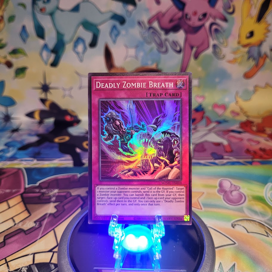 A Super Rare "Deadly Zombie Breath" card from the Yugioh Set: Maze of Muertos (MZMU).