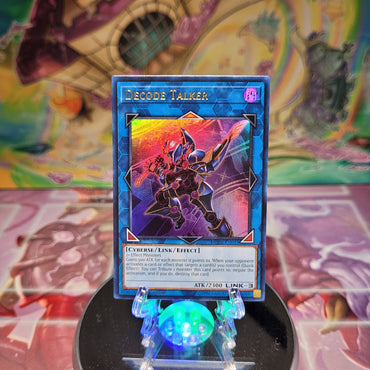 An Ultra Rare "Decode Talker" card from the Yugioh Set: Duel Devastator.