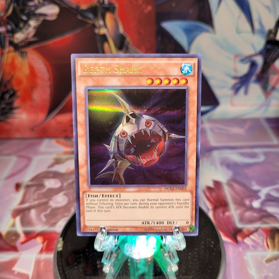 An Ultra Rare "Depth Shark" card from the Yugioh Set: Duelist Saga (DUSA).