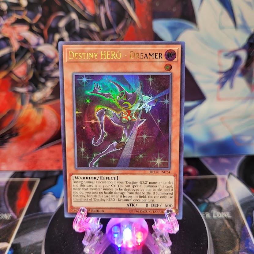 An Ultra Rare "Destiny Hero - Dreamer" card from the Yugioh Set: Battles of Legend: Relentless Revenge.