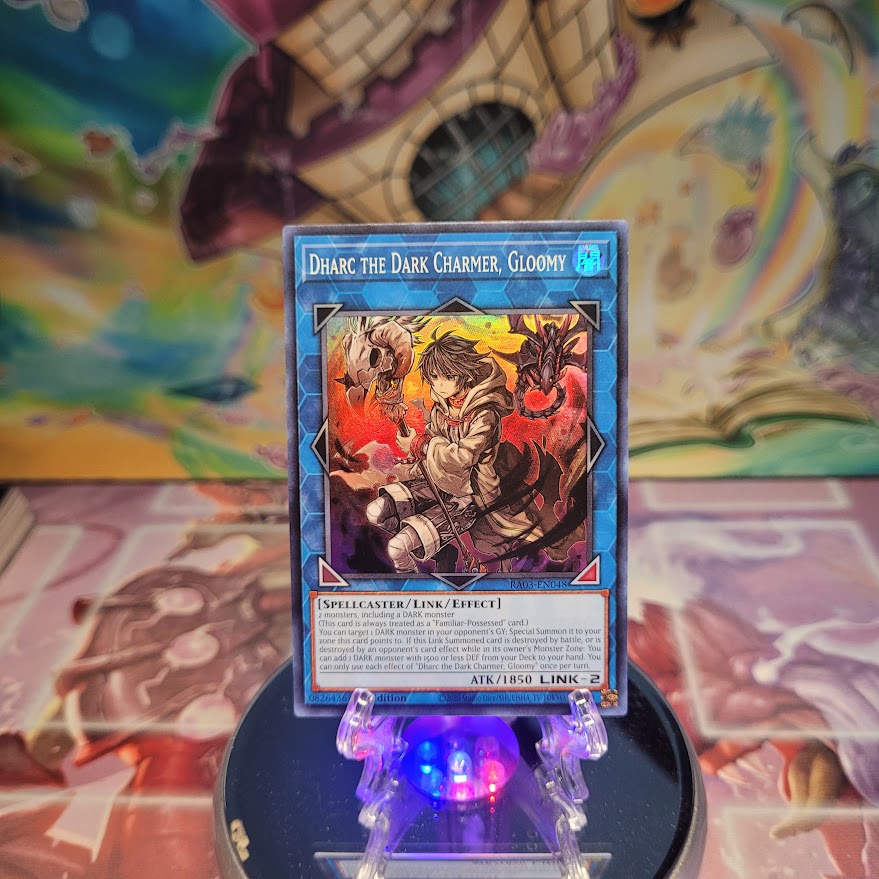 A Super Rare "Dharc the Dark Charmer, Gloomy" card from the Yugioh Set: Quarter Century Bonanza (RA03).