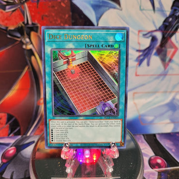 An Ultra Rare "Dice Dungeon" card from the Yugioh Set: Battles of Legend: Crystal Revenge.