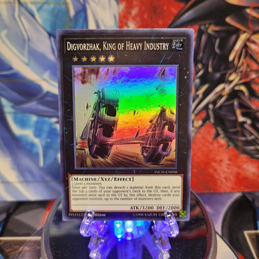  A Super Rare "Digvorzhak, King of Heavy Industry" card from the Yugioh Set: The Infinity Chasers.