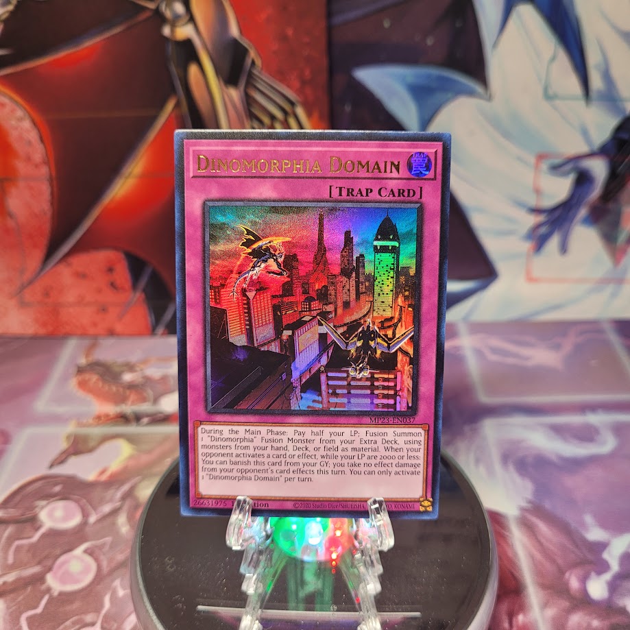 An Ultra Rare "Dinomorphia Domain" card from the Yugioh 25th Anniversary Tin: Dueling Heroes set.