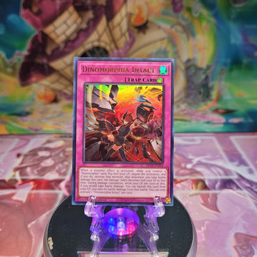 An Ultra Rare "Dinomorphia Intact" card from the Yugioh Set: 25th Anniversary Tin: Dueling Mirrors.