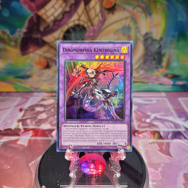 A Super Rare "Dinomorphia Kentregina" card from the Yugioh Set: 25th Anniversary Tin: Dueling Heroes Mega-Tin Mega Pack.