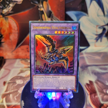 An Ultra Rare "Dinomorphia Stealthbergia" card from the Yugioh Set: 25th Anniversary Tin: Dueling Heroes (MP23).