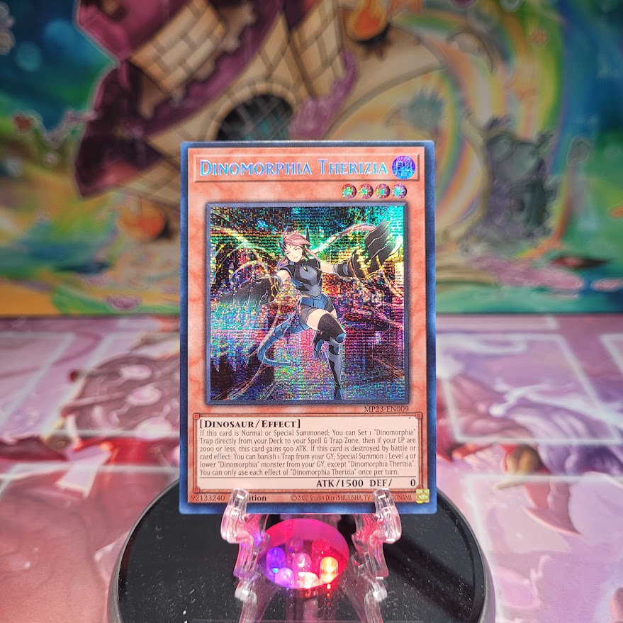 A Prismatic Secret Rare "Dinomorphia Therizia" card from the Yugioh Set: 25th Anniversary Tin: Dueling Heroes Mega-Tin Mega Pack.