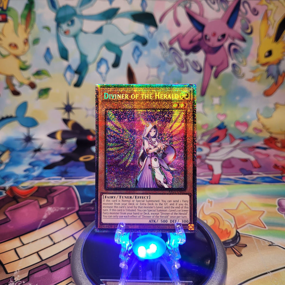 A Starlight Rare "Diviner of the Herald" card from the Yugioh Set: Rarity Collection 5 (RA05).