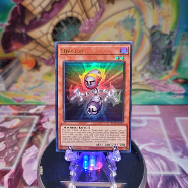 An Ultra Rare "Division" card from the Yugioh Set: Battles of Legend: Terminal Revenge.