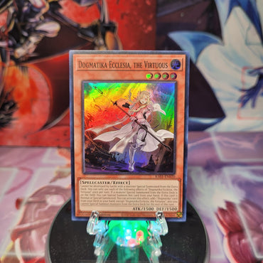 A Super Rare "Dogmatika Ecclesia, the Virtuous" card from the Yugioh Set: Rarity Collection 1 