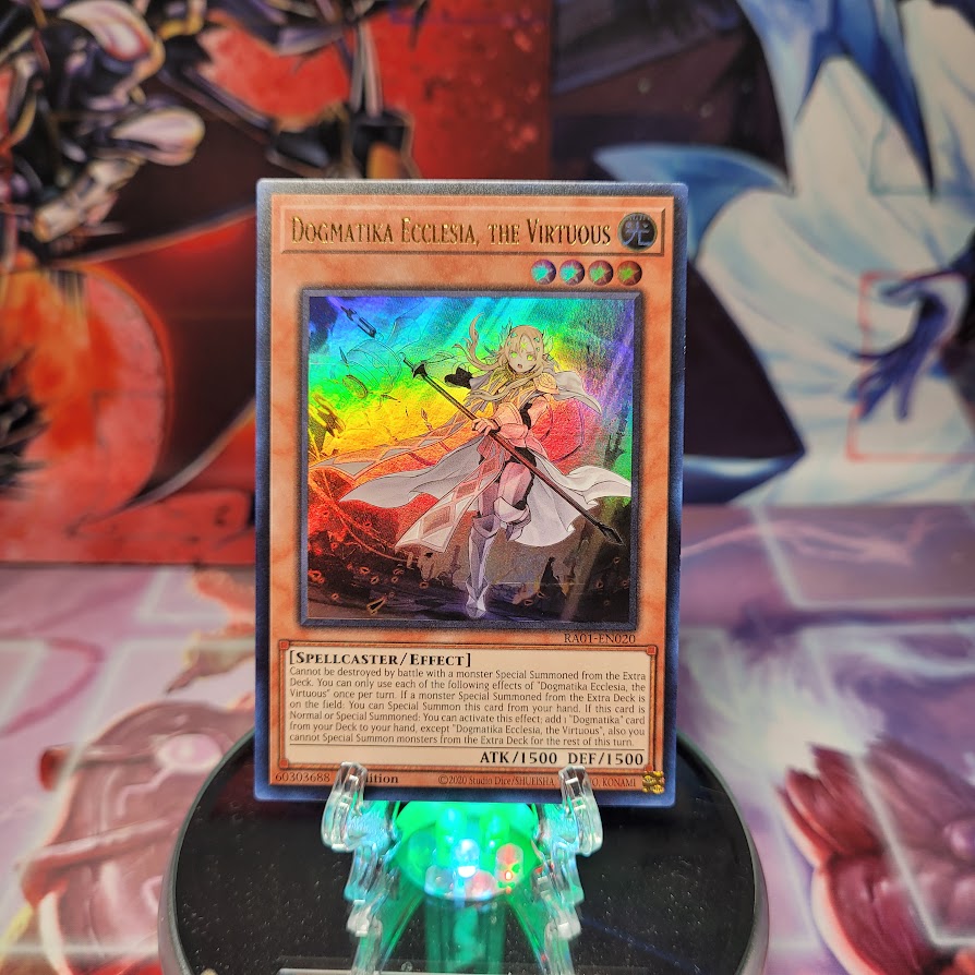 An Ultra Rare "Dogmatika Ecclesia, the Virtuous" card from the Yugioh Set: Rarity Collection 1 (RA01).