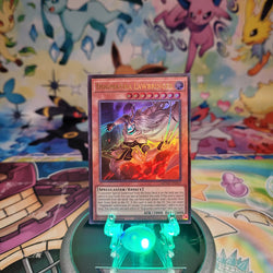 An Ultra Rare "Dogmatika Lawbringer" card from the Yugioh Set: Maze of Muertos (MZMU).