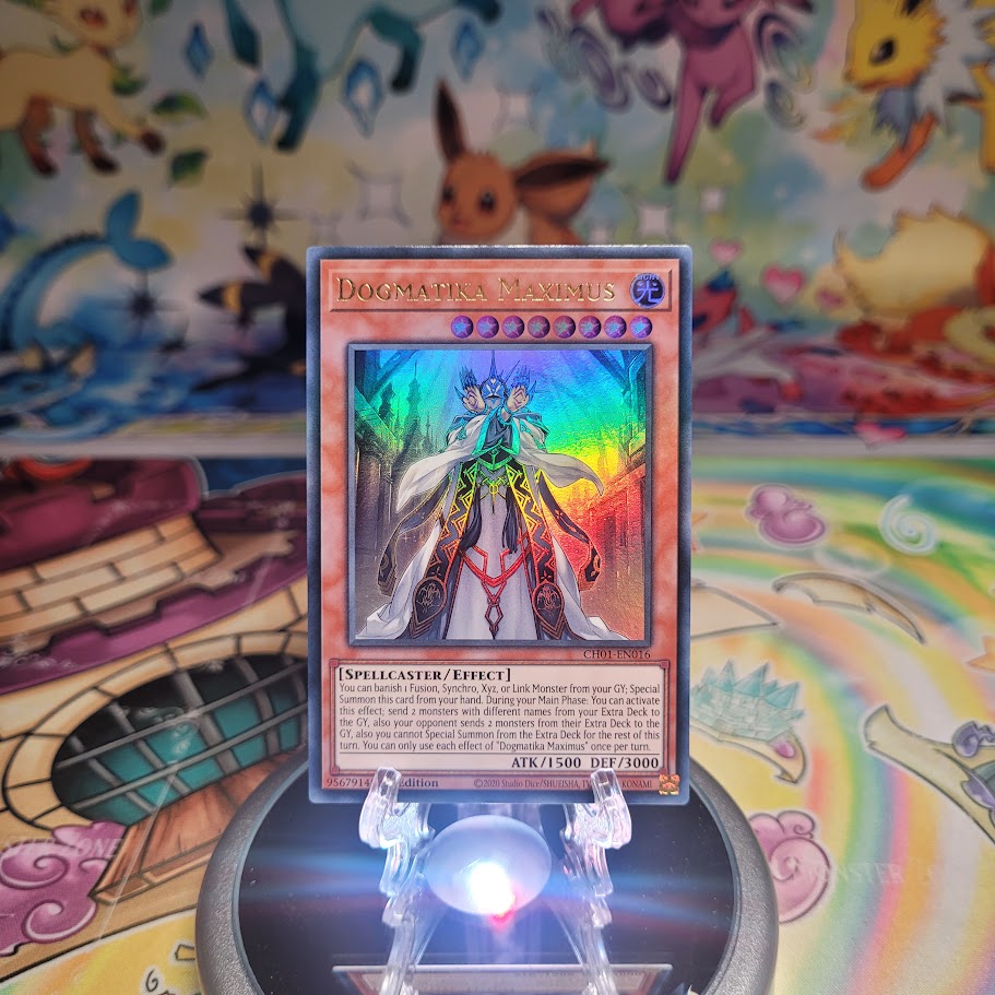 An Ultra Rare "Dogmatika Maximus" card from the Yugioh Structure Deck: The Fallen & The Virtuous (CH01).