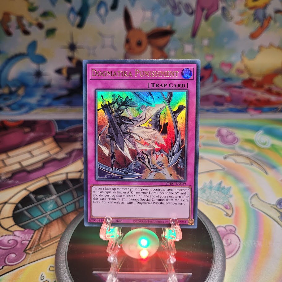 An Ultra Rare "Dogmatika Punishment" card from the Yugioh Structure Deck: The Fallen & The Virtuous (CH01).