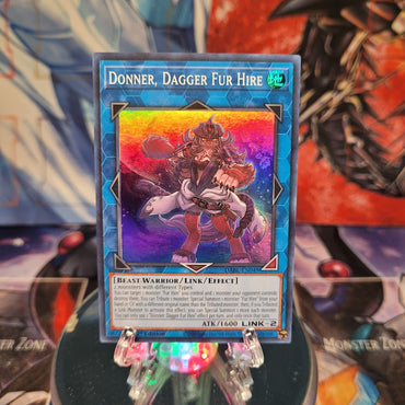 A Super Rare "Donner, Dagger Fur Hire" card from the Yugioh Set: Darkwing Blast.