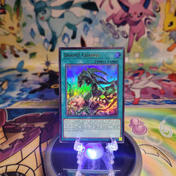 An Ultra Rare "DoomZ Change" card from the Yugioh Set: Magnificent Monsters (MAMO).