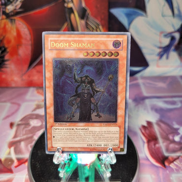 An Ultimate Rare "Doom Shaman" card from the Yugioh Set: Tactical Evolution (TAEV).
